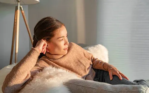 woman-sitting-looking-window