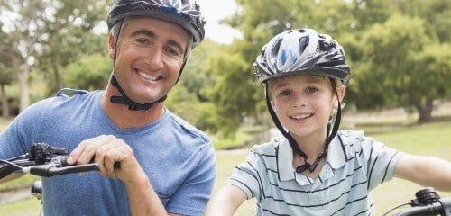 boy-and-father-biking-web